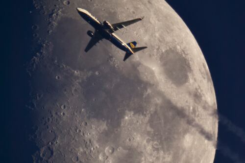 Fly me to the moon: Photographer snaps aircraft using telescope