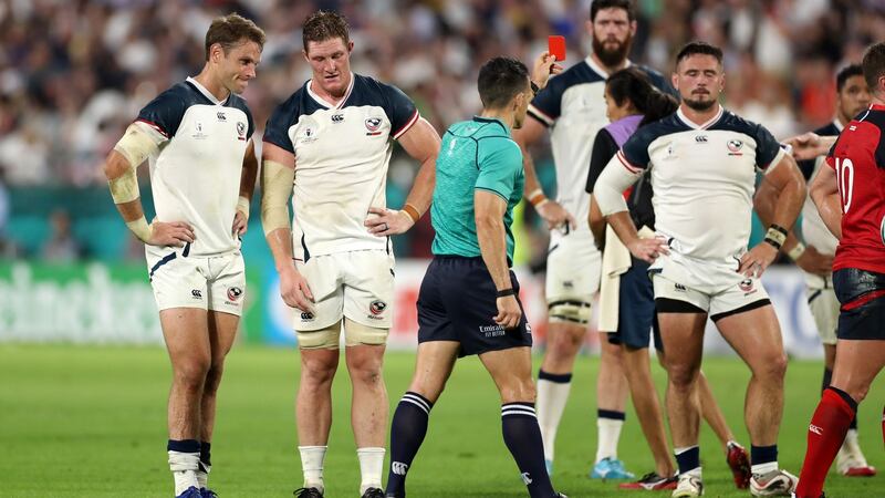 Referee Nic Berry shows a red card to John Quill (second from left). Photo: Mike Hewitt/Getty Images