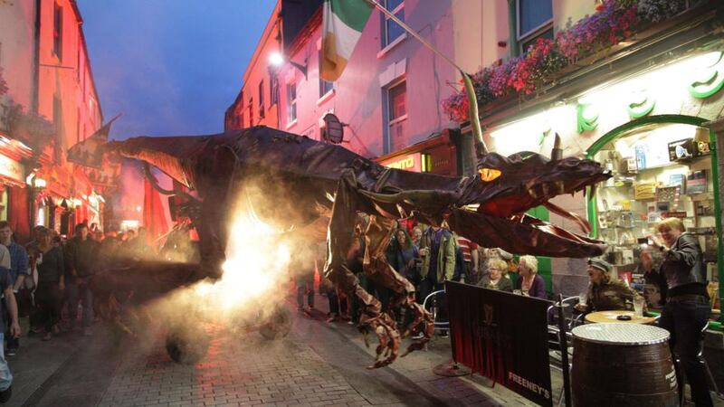 An angry dragon roaming through High Street during Galway Arts Festival. Dragons was presented by one of Europe’s most exciting outdoor theatre companies, the world famous Sarruga from Barcelona. Photograph: Joe O’Shaughnessy