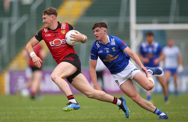 Down’s Ryan McEvoy gets away from Cian Reilly of Cavan during the Tailteann Cup quarter-final at Kingspan Breffni Park. Photograph: Leah Scholes/Inpho