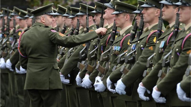 Final adjustments by company Sgt Ray Reynolds to the guard of honour from the 27 Infantry Battalion, Aiken Barracks, Dundalk, at the annual 1916 commemoration ceremonies at The Church of the Sacred Heart, Arbour Hill Dublin.