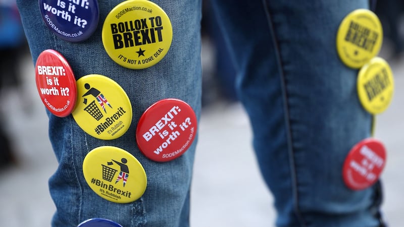 Badges on a pro-EU supporter outside the annual Labour Party Conference in Liverpool. Photograph: Hannah McKay/Reuters