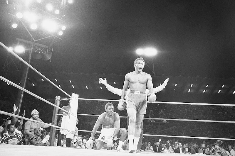 Challenger George Foreman walks away from champion Joe Frazier as he wins the world heavyweight championship in Kingston, Jamaica, in January, 1973. Photograph: Bettmann