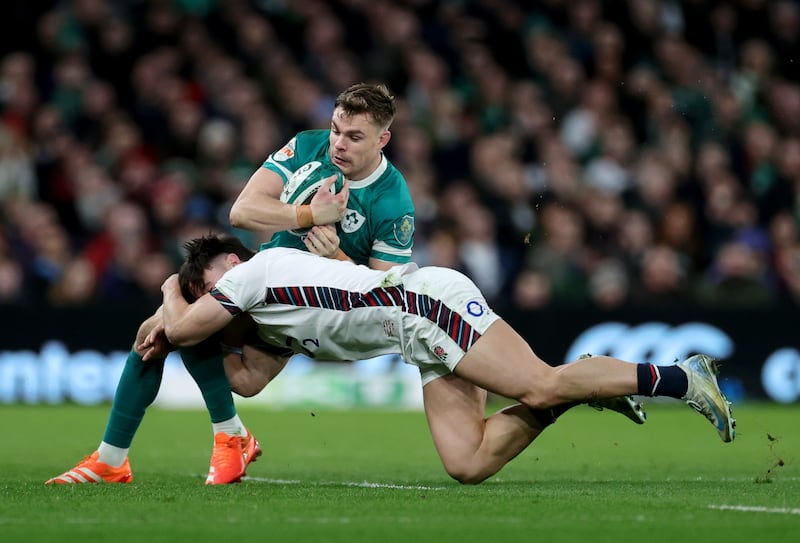 Garry Ringrose of Ireland is tackled by Cadan Murley of England as they were given very little space to play at the Aviva in the first half. Photograph: David Rogers/Getty