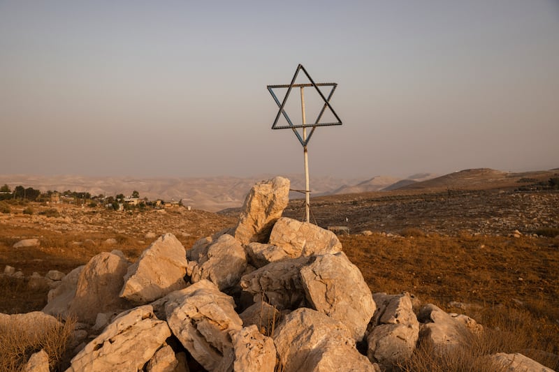 A Star of David on the edge of Tekoa Dalet, an illegal outpost in the West Bank. Photograph: Tamir Kalifa/The New York Times
                      