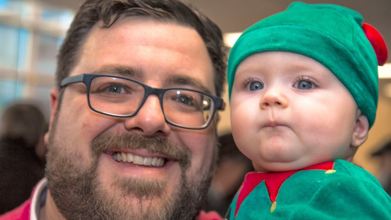 Jason Dorgan with  Shay (7 months), from Douglas, as Roy Keane lights up the Christmas tree at  Marymount hospice in Cork. Photograph Michael Mac Sweeney/Provision