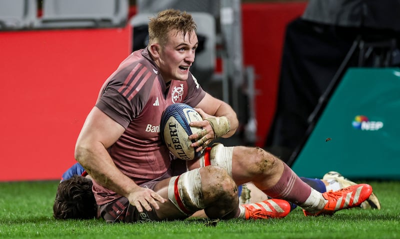 Munster's Gavin Coombes celebrates scoring a try. Photograph: Billy Stickland/Inpho