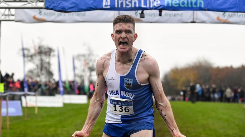 Liam Brady of Tullamore Harriers celebrates his victory in the senior men’s race. Photograph: Sam Barnes/Sportsfile