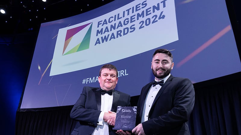 Paul Kavanagh, business development director of LMC FM, presents the workplace & estates manager of the year award to Paul McGuiness, Dalata Hotel Group