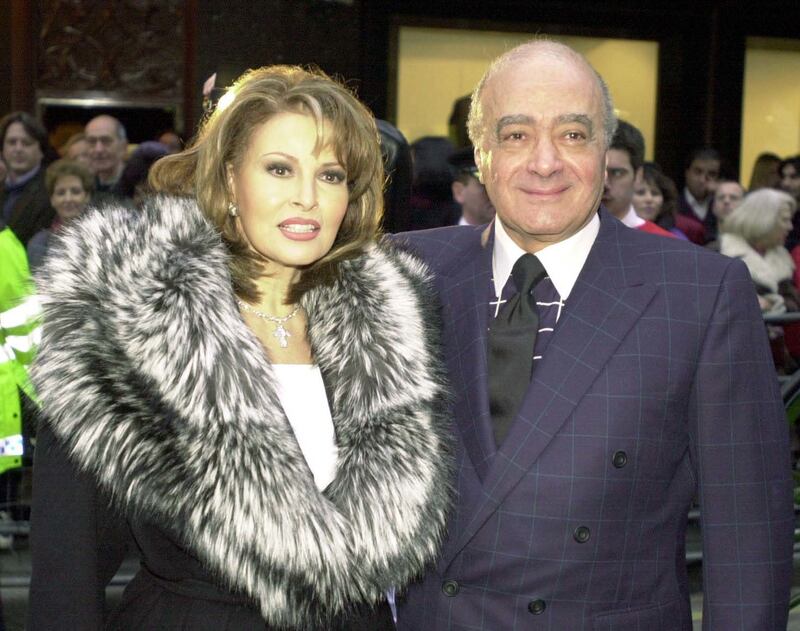 Harrods owner Mohamed al Fayed greeting film star Raquel Welch (59), to his store in Knightsbridge, London, as she opened the January sale in 2000. Photograph: John Stillwell/PA