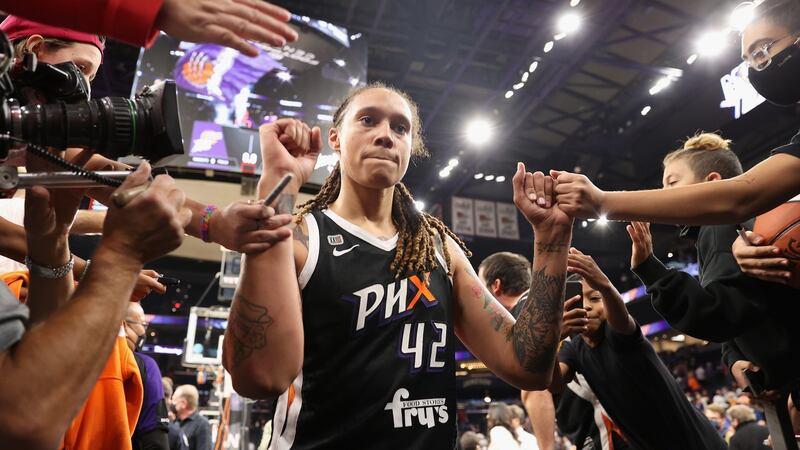 Brittney Griner #42 of the Phoenix Mercury celebrates with fans following Game Two of the 2021 WNBA Finals. Photograph:  Christian Petersen/Getty