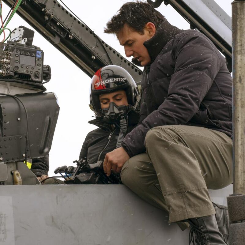 Monica Barbaro and Tom Cruise on the set of Top Gun: Maverick