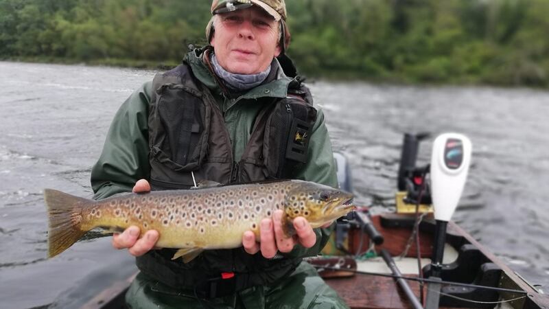 John Purtill from Clydagh, Co Mayo with a fine trout of four pounds from the Kilbeg area of Lough Corrib.