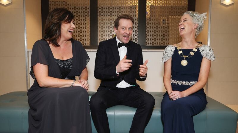 Blessed among women: Comedian Ardal O’Hanlon shares a joke with Aine Myler, director general of the SCSI and president of the Society, Claire Solon.