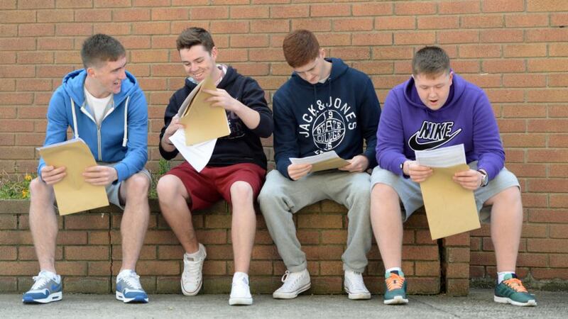 Jordan Lawless, Cain Rooney, James Broughal and Sean Cardiff opening their Leaving Certificate results at St John’s De La Salle College, Ballyfermot, Dublin this morning. Photograph: Frank Miller / The Irish Times