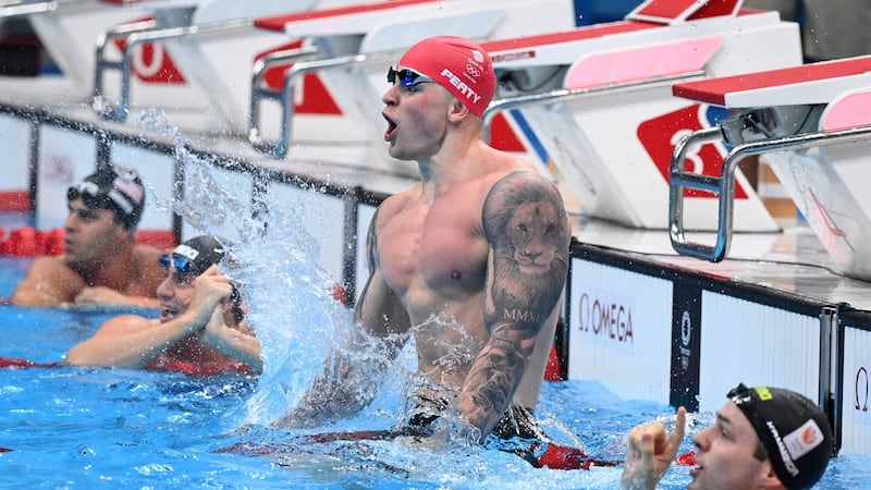 Adam Peaty celebrates winning gold. Photo: Attila Kisbenedek/AFP via Getty Images