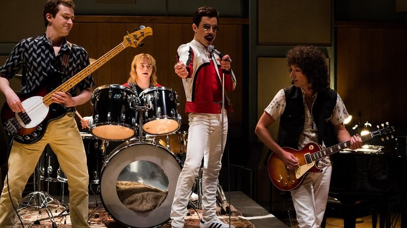 Joe Mazzello (John Deacon), Ben Hardy (Roger Taylor), Rami Malek (Freddie Mercury), and Gwilym Lee (Brian May) star in Twentieth Century Fox’s BOHEMIAN RHAPSODY. Photo Credit: Alex Bailey.