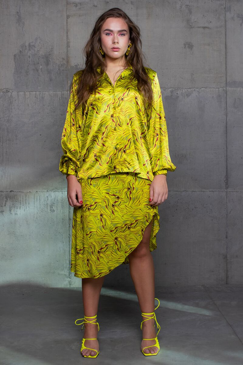 Yellow swirl print shirt €565, skirt €450 in stretch silk satin