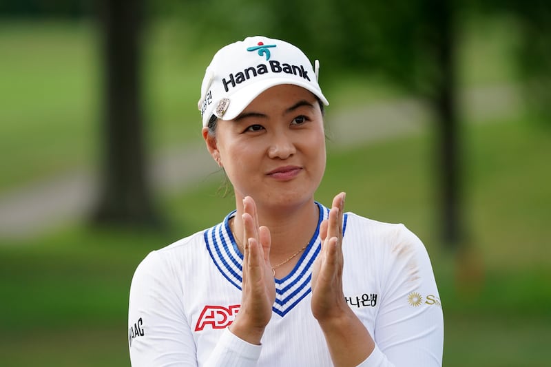 Minjee Lee of Australia looks on during the trophy ceremony after winning in a two-hole playoff against Charley Hull during the final round of the Kroger Queen City Championship in Cincinnati, Ohio. Photograph: Dylan Buell/Getty Images