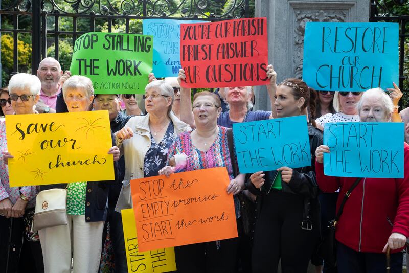 Protesters outside the Archbishop's Palace in Drumcondra call for funds to be directed into the renovation of the Immaculate Heart of  Mary Church on City Quay. Photograph: Colin Keegan, Collins Dublin