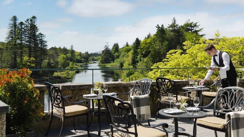 Experience terrace dining at Ballynahinch Castle.