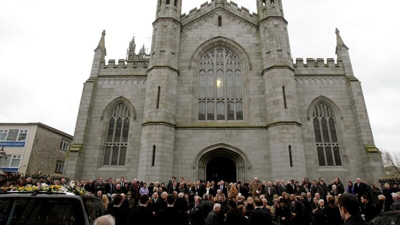 Mourners gather outside Newry Cathedral, Co. Down, following the requiem mass for Lord Ballyedmond also known as Dr Edward Haughey. Photograph: Brian Lawless/PA Wire