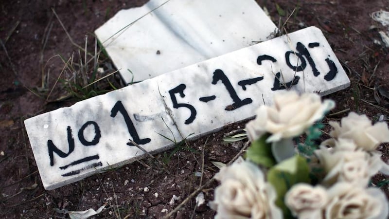 Burial place: Numbers and presumed dates of death are marked on rudimentary headstones for those drowned off the coast of Lesbos, where nearly 350,000 people have passed through this year. Photograph: Carl Court/Getty