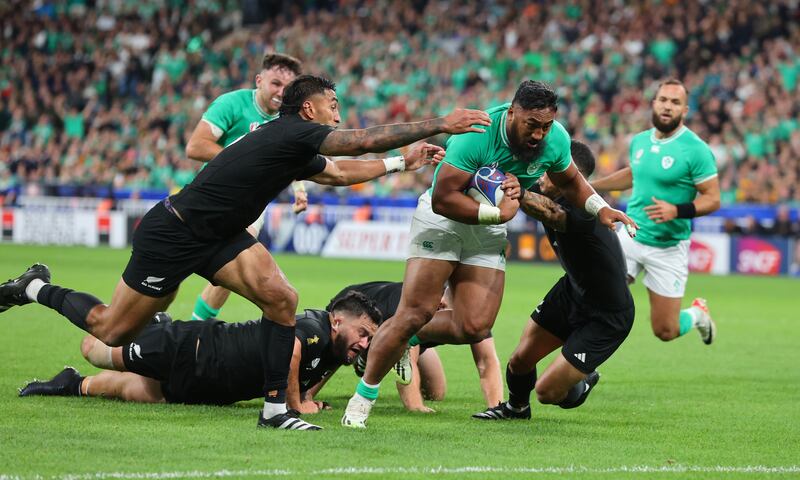 Bundee Aki scores for Ireland against New Zealand at the 2023 World Cup. Photograph: Billy Stickland/Inpho