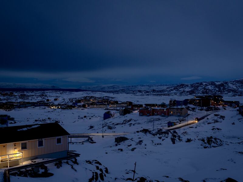 A car drives on one of the few roads that connect the small fishing town of Ilulisaat, in Greenland. Photograph: Ivor Prickett/New York Times
                      