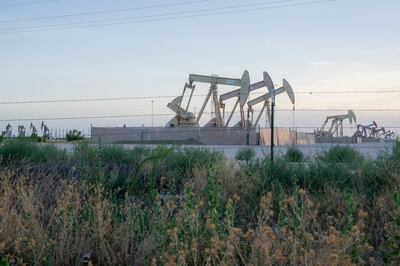 
Pump jacks extract crude oil from wells outside Midland, Texas, last July. Photograph: Desiree Rios/The New York Times                  