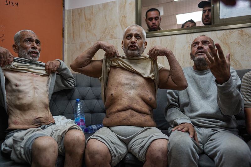 Palestinian men who had been detained by Israeli forces at the Al-Aqsa Martyrs Hospital in Deir al-Balah in the central Gaza Strip. Photograph: Bashar Taleb/AFP via Getty Images