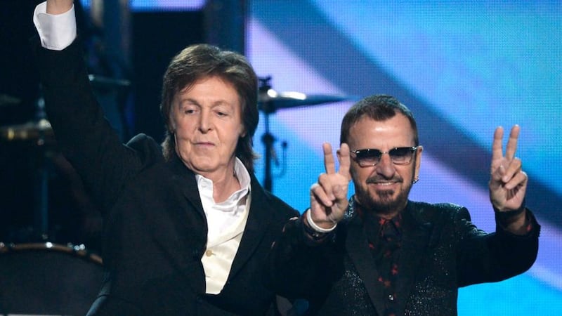 Paul McCartney (L) and Ringo Starr of The Beatles perform during the 56th Grammy awards at Staples Centre in Los Angeles. Photograph: Kevork Djansezian/Getty Images