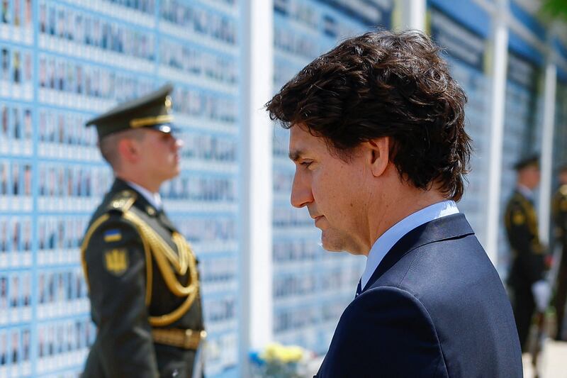 Canadian prime minister Justin Trudeau visits the Wall of Remembrance in Kyiv, Ukraine, to pay tribute to Ukrainian soldiers killed during Russia's invasion. Photograph: Valentyn Ogirenko/Getty