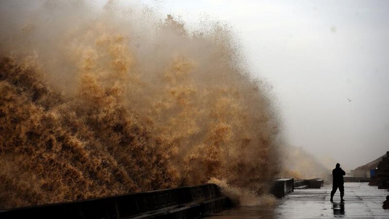 Waves crash onto the promenade between Fleetwood and Blackpool as high tides and huge waves hit the west coast of the UK. Photograph: John Giles/PA