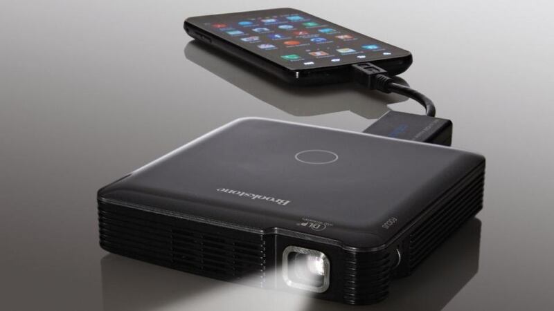 Brookstone’s travel projector is  portable and virtually pocketable