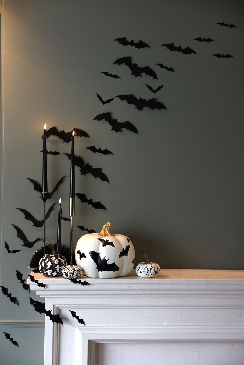 Fireplace bats and pumpkins. Photograph: Dara Mac Dónaill