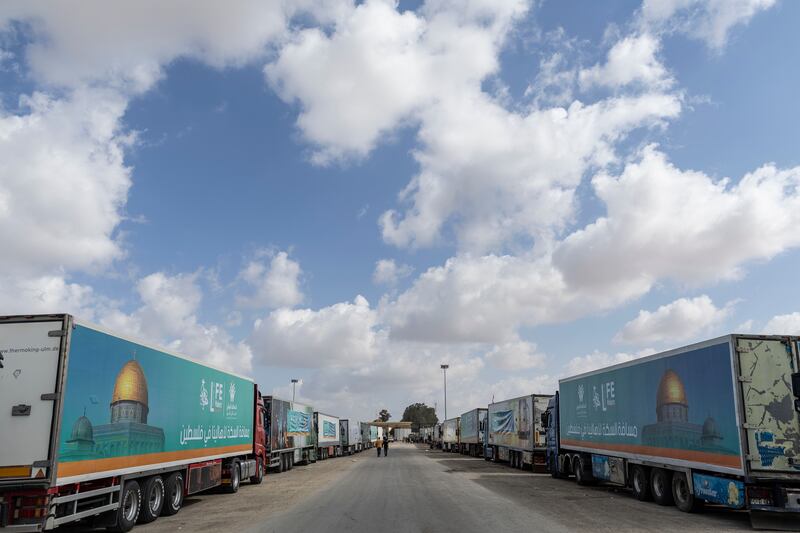 Aid convoy trucks wait at the Rafah border crossing for clearance to enter Gaza on October 19th in North Sinai, Egypt. Photograph: Mahmoud Khaled/Getty