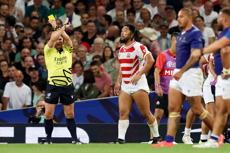 Shota Horie of Japan prepares to leave the field after receiving a yellow card from referee Jaco Peyper, as an eight-minute window for a TMO bunker review begins during a Rugby World Cup France 2023 match between Japan and Samoa. Photograph: Phil Walter/Getty 