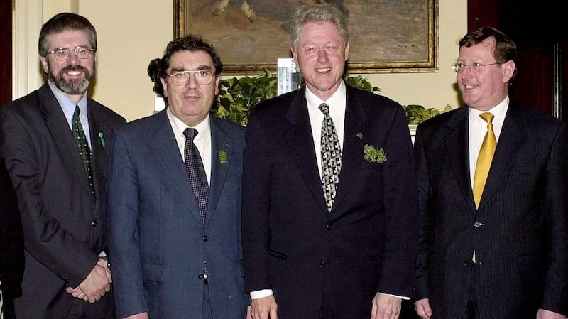 John Hume with Gerry Adams, Bill Clinton and David Trimble at the White House in March 2000. Photograph: Joyce Naltchayan/AFP/Getty Images