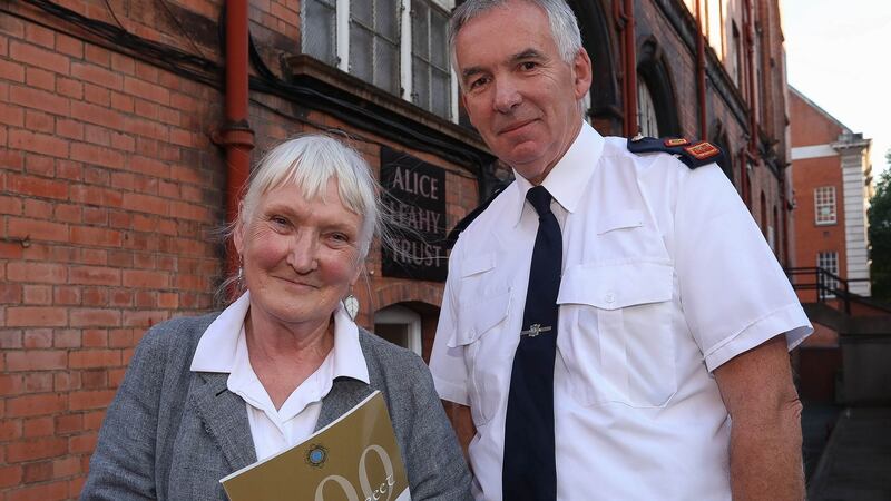 Alice Leahy and Supt Joe Gannon, of Pearse Street Garda station, at the Alice Leahy Trust, Bride Street, Dublin.  Gardaí have been generous in their support of the trust. Photograph: Conor Ó Mearáin