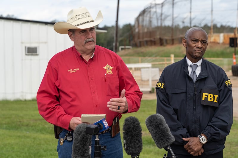 San Jacinto county sheriff Greg Capers and special agent in charge of the FBI Houston James Smith speak to the media near the crime scene where five people were killed in  a shooting. Photograph: Go Nakamura/Getty Images