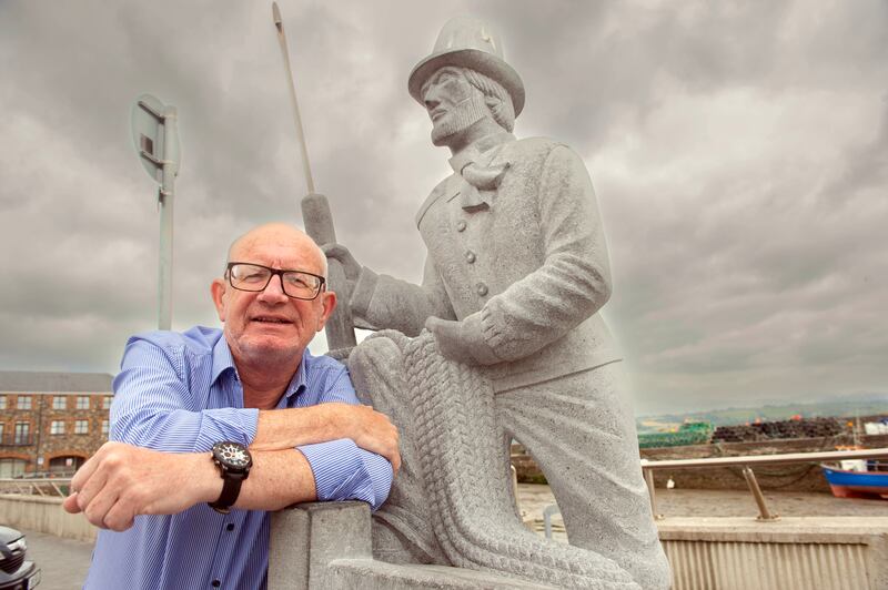 Michael Hussey at the statue of Captain Ahab on the quay in Youghal, Co Cork. Photograph: Michael Mac Sweeney/Provision