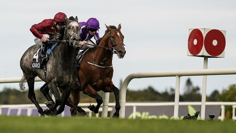 Oisin Murphy riding Roaring Lion (left) wins The Irish Champion Stakes from Ryan Moore and Saxon Warrior. Photograph:  Alan Crowhurst/Getty Images