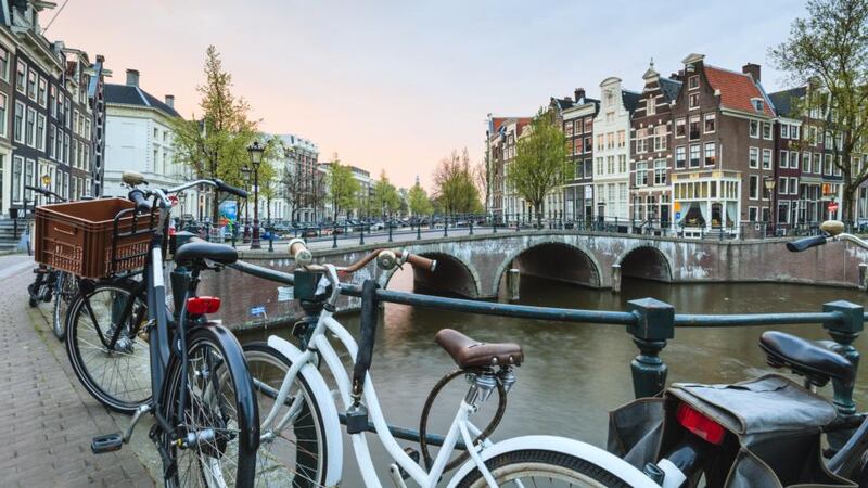 Cycle around Amsterdam and take in its fantastic art galleries, museums, flower markets and traditional cafe bars