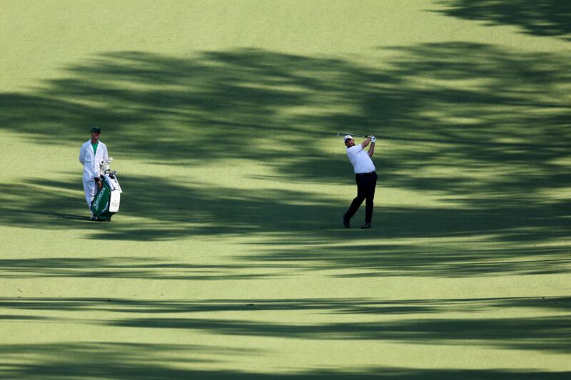 Shane Lowry hitting his second shot on the 10th hole during a practice round at Augusta National. Photograph: Andrew Redington