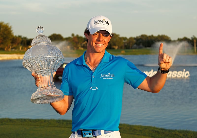 Rory McIlroy poses with the trophy after winning the 2012 Honda Classic at PGA National in Palm Beach Gardens, Florida. Photograph: Mike Ehrmann/Getty Images