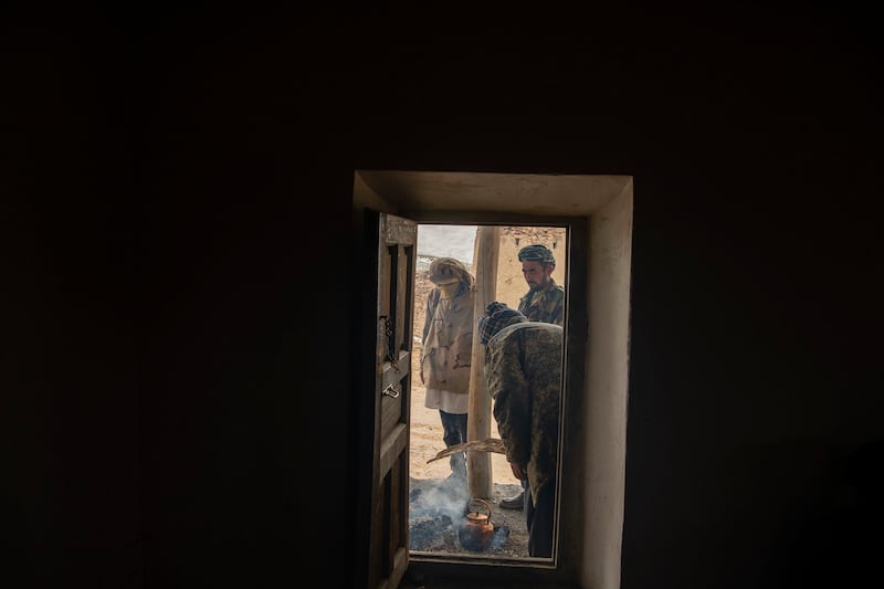 Mawlawi Mahdi Mujahid’s fighters temporarily shelter after a snowstorm hit Qom Kotal mountain, in Balkhab, Afghanistan in June. Photograph: Kiana Hayeri/The New York Times