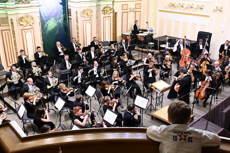 Italian-American conductor Raffaele Ponti appears in Lviv to a rapturous reception. The audience appreciates he made the journey to Ukraine in spite of the risks. Photograph: Danylo Bedriy