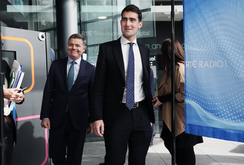 Minister for Finance Jack Chambers (right) and Minister for Public Expenditure Paschal Donohoe arrive to speak to members of the media after appearing on RTE's Claire Byrne show for the traditional post-Budget phone-in.  Photograph: Brian Lawless/PA Wire