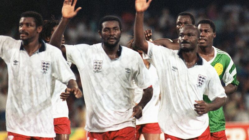 Cameroon’s  François Omam Biyick (L), Stephen Tataw and Roger Milla after their 1990 World Cup defeat to England. Photograph: Georges Gobet/AFP